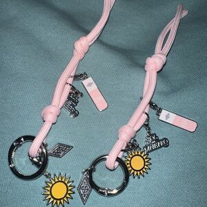 Sol de Janeiro Pink and Silver Bag Charm/Keychain with Sun Charm